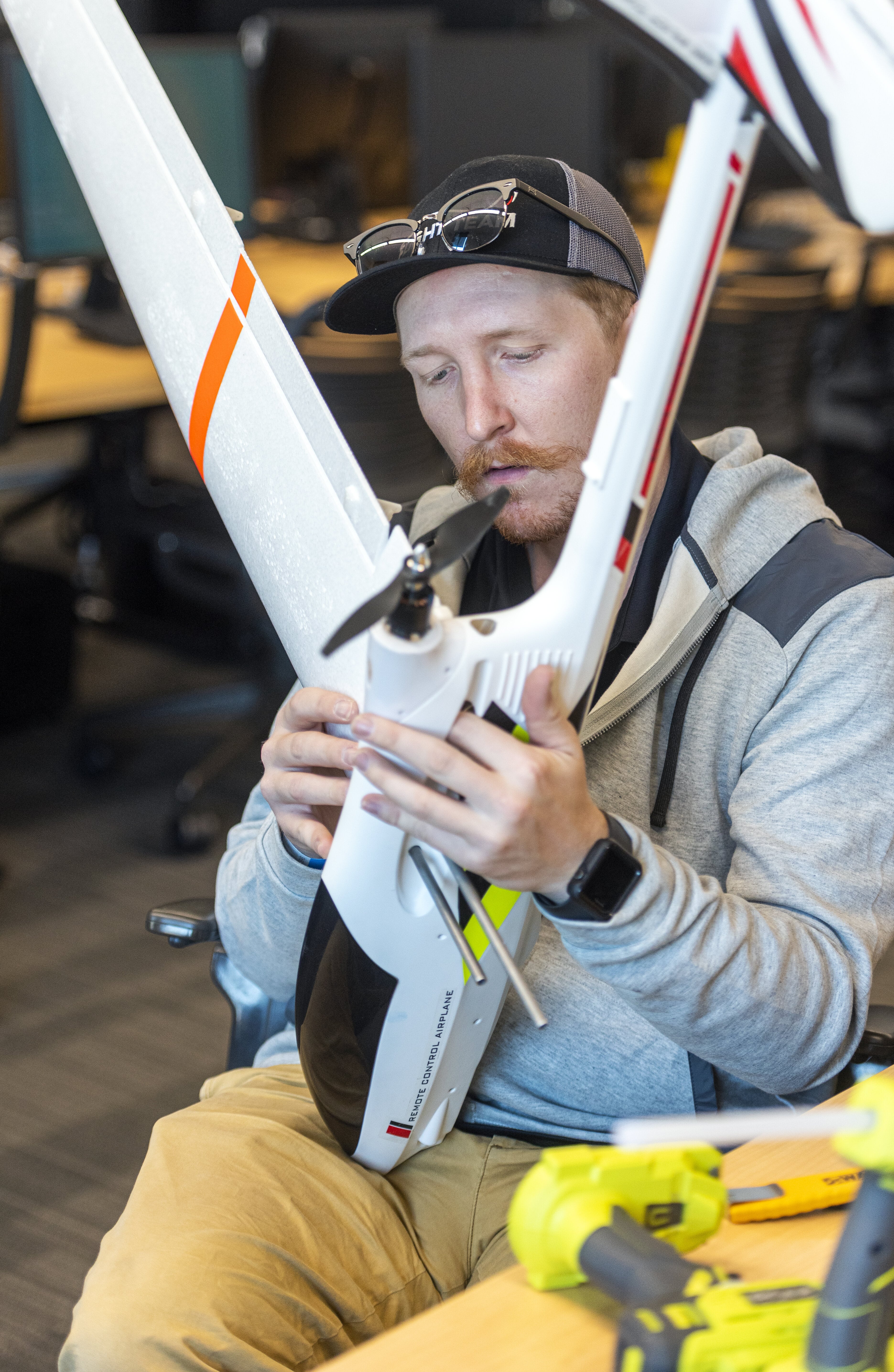 Aims student working in a fixed wing drone aircraft at the Windsor Campus