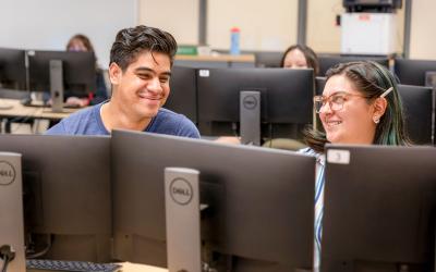 Two Aims students at the computer