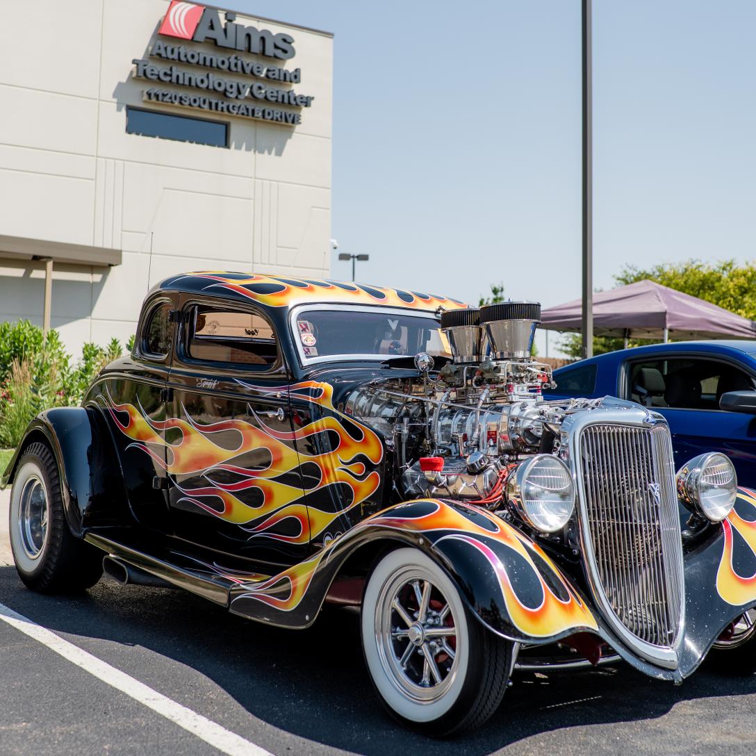 Car with Flames on Display at Aims Car Show