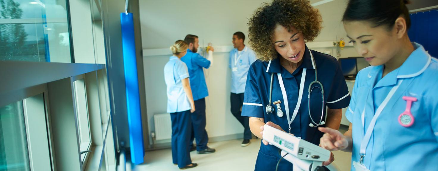 Nursing student with professor