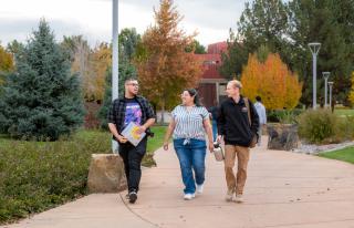 Students walking across Greeley Aims campus