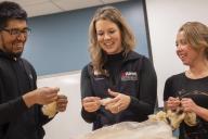 Amy McFarland with two students