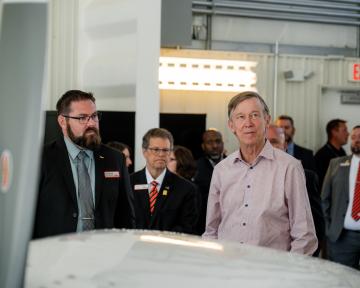 Hickenlooper looking at planes